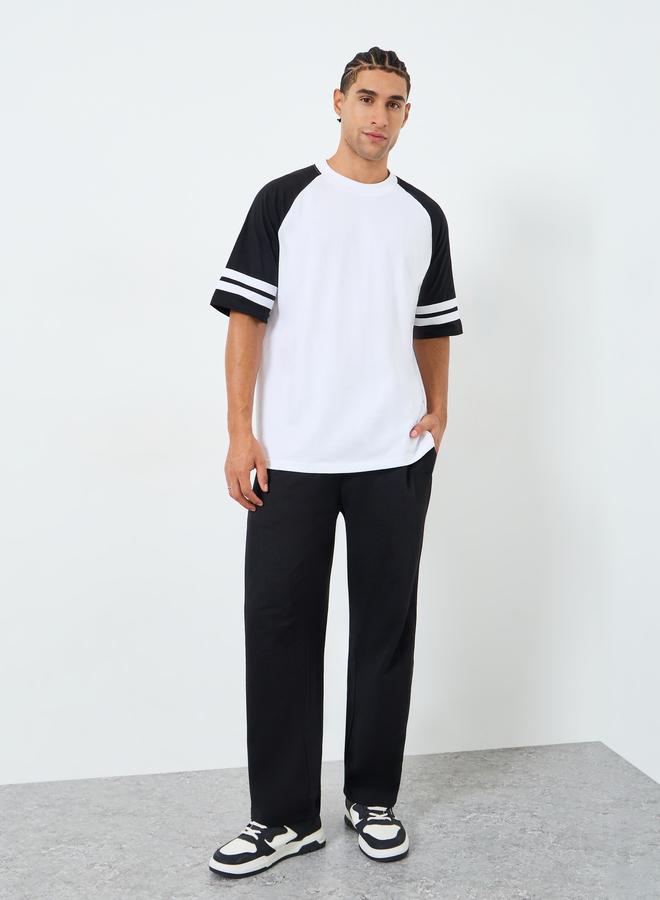 ستايلي تيشيرت بأكمام راجلان وتصميم كتل ألوان وقصة واسعة للرجال - Image 1